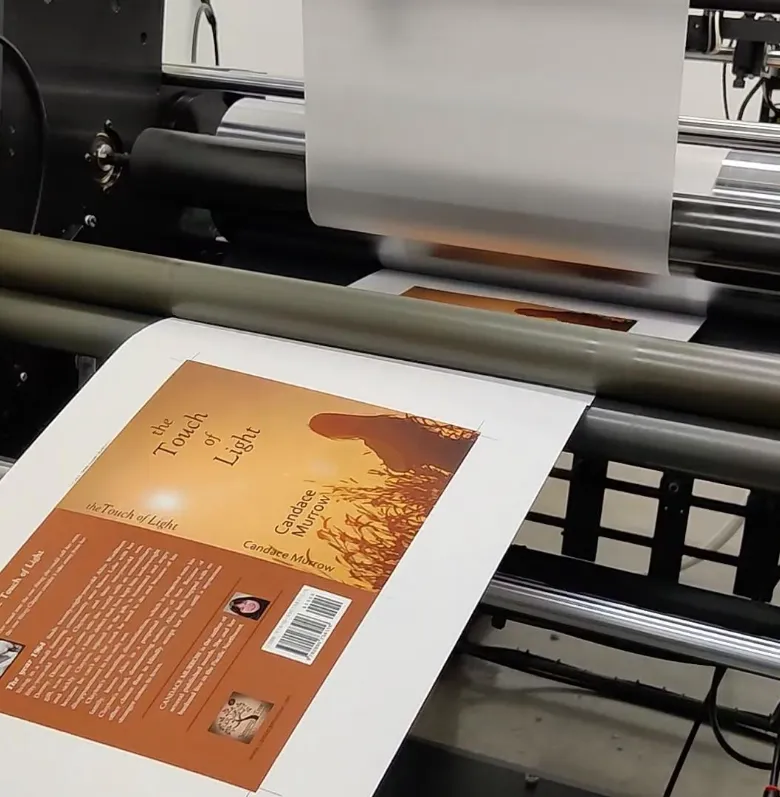 Book cover sheet coming off an eco-friendly press